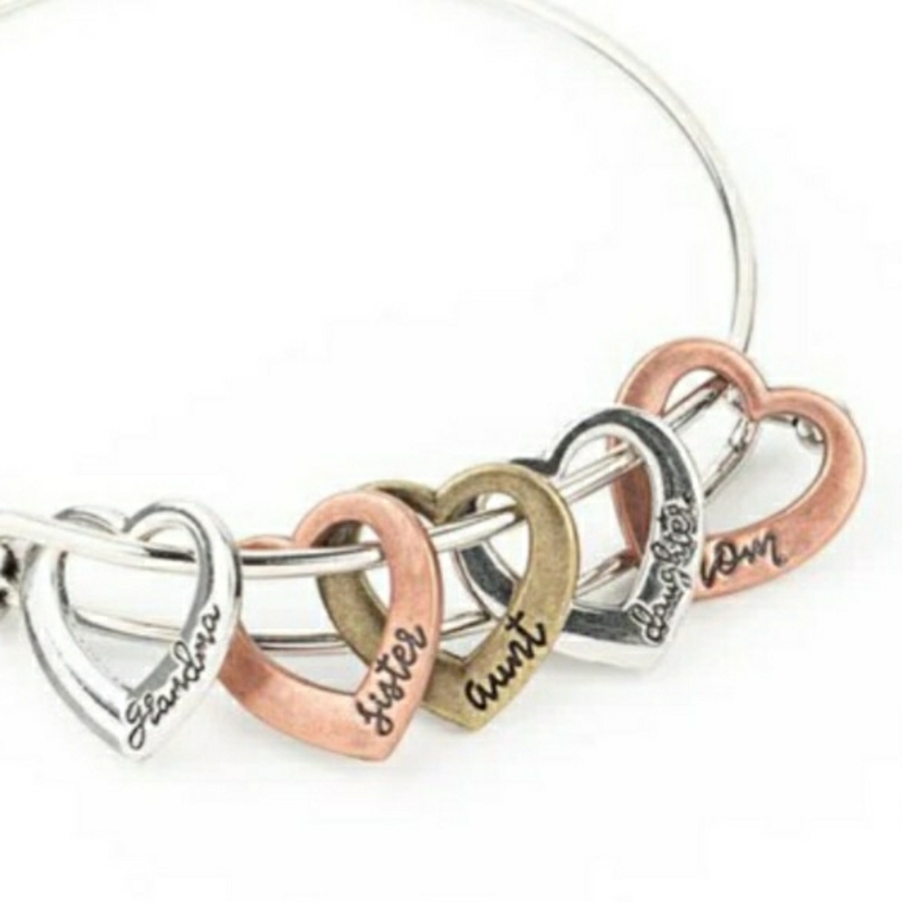 Heart Charm Bracelet with Silver, Gold, and Pink Accents